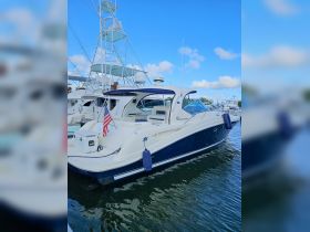 A stunning view of a docked yacht, showcasing its sleek design and features against a clear blue sky — perfect for luxury boating enthusiasts.
