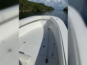 Interior view of a sleek boat helm, showcasing the spacious and clean design, perfect for a day on the water.