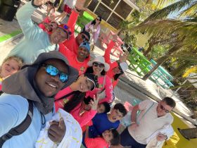 A joyful group poses for a selfie, capturing the excitement of their day together — perfect for family outings or group adventures.