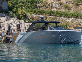 A stylish Colnago 35 boat docked with guests onboard, showcasing a perfect blend of luxury and leisure in a scenic waterfront setting.