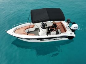 Aerial view of a sleek rental boat with a canopy, showcasing its stylish design and comfortable seating, perfect for a day on the water.