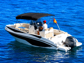 A sleek speedboat named 'Penelope' navigates through clear blue waters, showcasing its stylish design and perfect for thrilling water adventures.