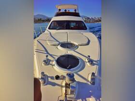 A group of friends enjoys a scenic ride on a yacht, capturing the essence of a perfect day on the water.