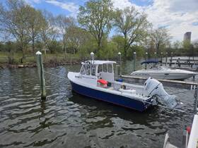A well-maintained boat docked at the marina, showcasing its sleek design and readiness for adventure on the water.
