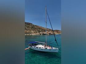 A lively group enjoys a day sailing on a beautiful yacht in crystal-clear turquoise waters, perfect for summer adventures and relaxation.