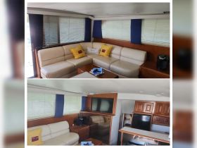 A cozy interior view of a boat's lounge area featuring comfortable seating and modern amenities, perfect for relaxing during a day on the water.