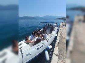A lively group enjoys their time aboard a boat, perfect for celebrations and fun outings on the water.