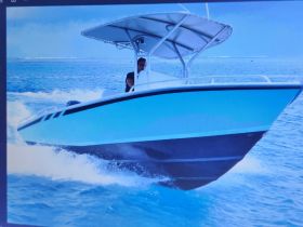 A sleek speedboat cuts through the waves, showcasing its vibrant design and dynamic movement on the water.