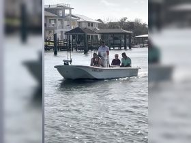 A group of friends enjoys a day out on the water aboard a fishing boat, perfect for creating memorable experiences while exploring the coastline.
