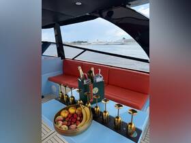 A beautifully arranged spread of fruits and cocktails on a luxurious boat, perfect for entertaining guests while enjoying a day on the water.