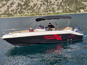 A family enjoys a day on the water aboard a Marinello boat, showcasing the perfect blend of adventure and relaxation.
