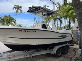 A well-maintained Hydra-Sports boat docked and ready for adventure, showcasing its sleek design and sturdy build.