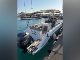 A sleek yacht named 'Shir-Mar' docked in a serene harbor, showcasing its elegant design and inviting atmosphere for a perfect day on the water.