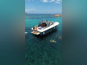A lively group enjoys a summer day on a boat, with some swimming in the crystal-clear waters — perfect for a fun day out on the water.