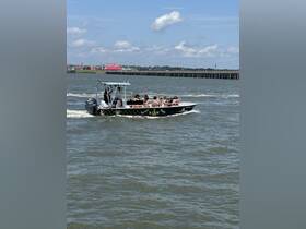 A lively group enjoys a boat ride on a taxi vessel, perfect for exploring the waters and enjoying the sun.