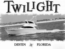 The 'Twilight' yacht glides through the waters off Destin, Florida, showcasing its sleek design and elegance — perfect for luxury outings and fishing trips.
