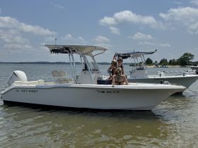 A group enjoys a sunny day on the water aboard a Key West boat, perfect for family outings and water adventures.