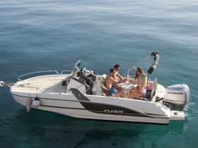 A lively group enjoys drinks on a boat, perfect for summer celebrations and memorable outings on the water.
