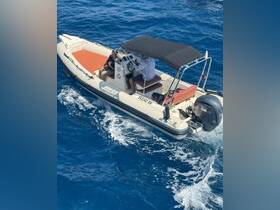A speedboat navigates through clear blue waters, showcasing its sleek design and performance on the open sea.