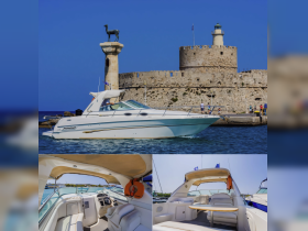 A stunning yacht glides past a historic fortress, showcasing the perfect blend of luxury and scenic beauty in Rhodes. Ideal for exploring the beautiful coastlines.