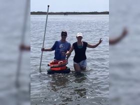 A cheerful group enjoys a fun day in the water, showcasing a lively atmosphere perfect for summer adventures and outdoor activities.