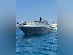 A sleek yacht glides through clear blue waters, showcasing its elegant design and perfect for luxury cruising.