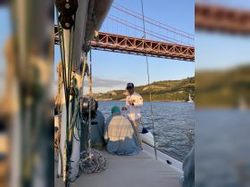 Guests enjoy a sailing experience near the iconic Golden Gate Bridge, creating memorable moments on the water.