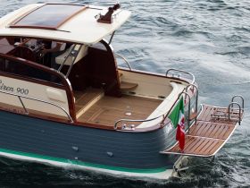 A detailed view of the Siren 900 boat showcasing its elegant design and craftsmanship, perfect for leisurely cruises on the water.