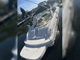 A sleek yacht docked at the marina, showcasing its elegant design and pristine condition — perfect for luxury outings on the water.