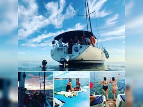 A lively group enjoys a day on the water aboard the 'Awakening' yacht, featuring swimming, sunset views, and fun moments captured with friends.
