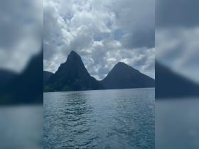 Stunning view of the iconic Pitons in St. Lucia, showcasing the breathtaking natural beauty of the Caribbean landscape.