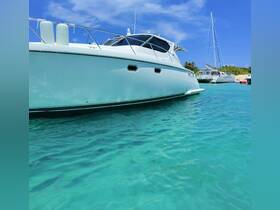 A stunning yacht anchored in crystal-clear waters, showcasing its sleek design and inviting atmosphere for a perfect day on the water.