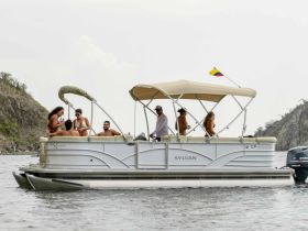 A lively group enjoys a fun day on a pontoon boat, soaking up the sun and creating unforgettable memories on the water.