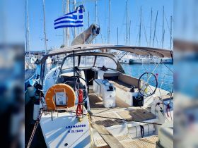 A well-equipped interior view of the sailing yacht 'Adamastos', showcasing the helm and seating area, perfect for comfortable cruising in the beautiful Greek waters.