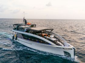 A sleek yacht cruising through open waters, showcasing its modern design and elegance — perfect for luxury charters and ocean adventures.