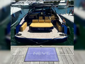 A stylish interior view of the NEVE boat, showcasing comfortable seating and a modern helm, perfect for luxurious outings on the water.