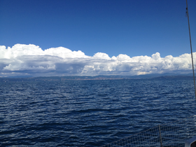 A scenic view of clouds and water, but the image lacks clarity and focus.