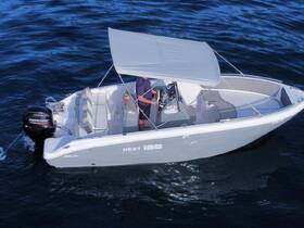 Aerial view of a sleek speedboat in motion, showcasing its modern design and spacious seating — perfect for water adventures.