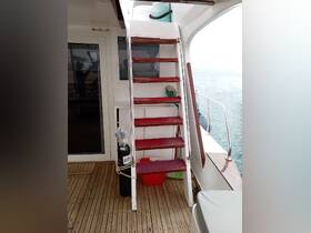 A view of the interior stairs on a boat, showcasing the access to upper levels — a functional design element for navigating between decks.