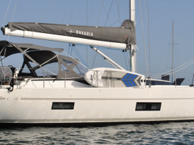 A sleek Bavaria sailboat captured from the side, showcasing its elegant design and features, perfect for sailing enthusiasts.