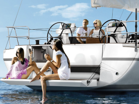 A lively group enjoys a sunny day aboard a yacht, sipping cocktails and soaking up the sun — perfect for a fun day on the water.