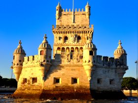 A historic structure captured against a clear blue sky, showcasing intricate architectural details. Ideal for exploring cultural landmarks.