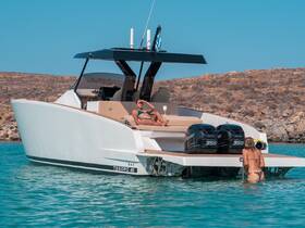 Two women enjoy a sunny day on a luxurious yacht, one relaxing on the deck while the other wades in the clear water — a perfect scene for summer fun and relaxation.