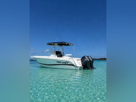 A sleek Pro-Line speedboat named 'Salty Pro' docked in crystal-clear turquoise waters, perfect for a day of adventure on the sea.