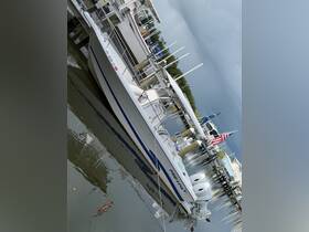 A sleek Pro-Line speedboat docked at the marina, showcasing its stylish design and ready for adventure on the water.