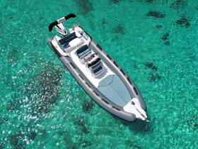A stunning aerial view of a sleek speedboat gliding over crystal-clear turquoise waters, perfect for exploring coastal destinations.