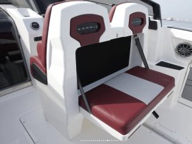 Interior view of a stylish helm seating area on a Karnic boat, showcasing modern design and comfort for an enjoyable boating experience.
