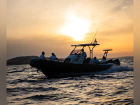 A group enjoys a scenic boat ride at sunset, capturing the essence of adventure on the water with stunning views.