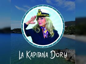 A woman in a captain's hat salutes, set against a scenic coastal background. The image features a playful design but lacks clarity on the context.