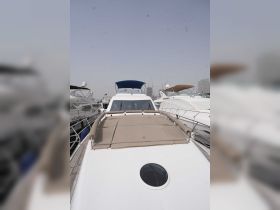 A clear view of a yacht's exterior, showcasing its sleek design and spacious deck, perfect for luxury outings on the water.